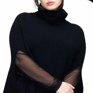 Universal standard sweater cape thing.